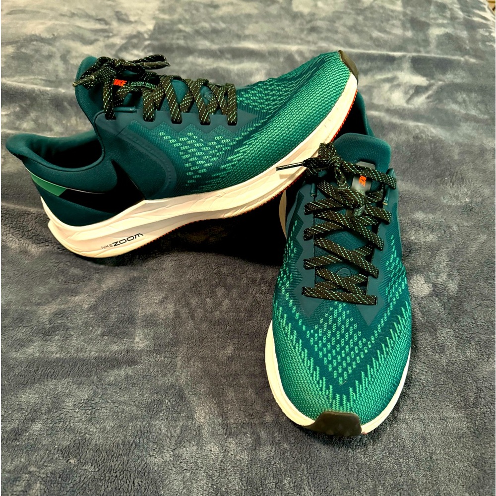 Nike Running Green shoes.